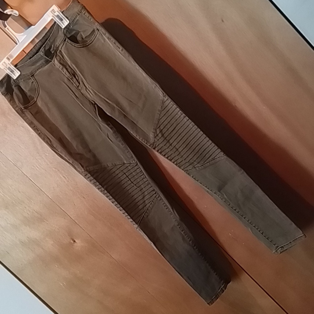 Junior's jeans size 5, biker/punk detailing at knees in army green.